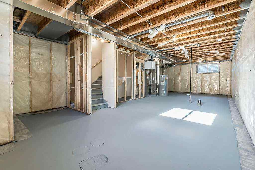MLS® A2222964 - 838 Creekside Boulevard SW in Pine Creek Calgary, Residential