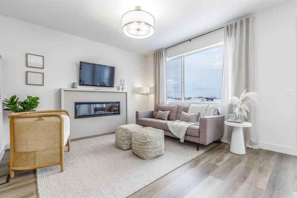 MLS® A2222990 - 84 Emberside Green  in Fireside Cochrane, Residential