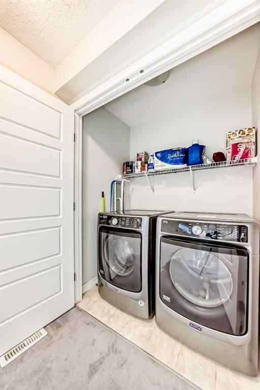 MLS® A2223029 - 163 Evanscrest Way NW in Evanston Calgary, Residential