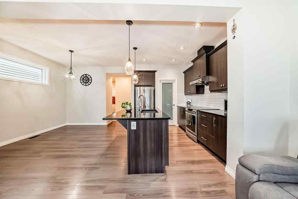 MLS® A2223029 - 163 Evanscrest Way NW in Evanston Calgary, Residential
