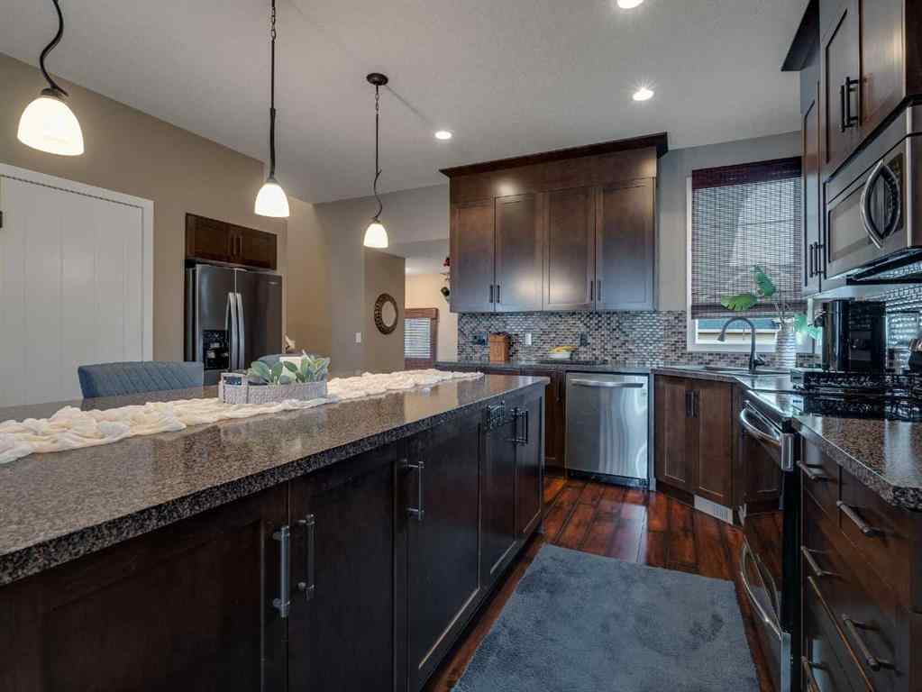 MLS® A2223579 - 460 Seclusion Valley Drive  in NONE Diamond Valley, Residential