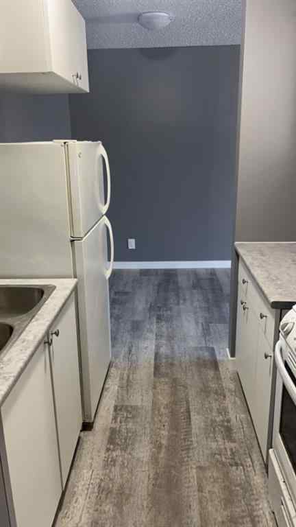 MLS® A2223588 - Unit #. 10019 104 Avenue  in Avondale Grande Prairie, Multi-Family