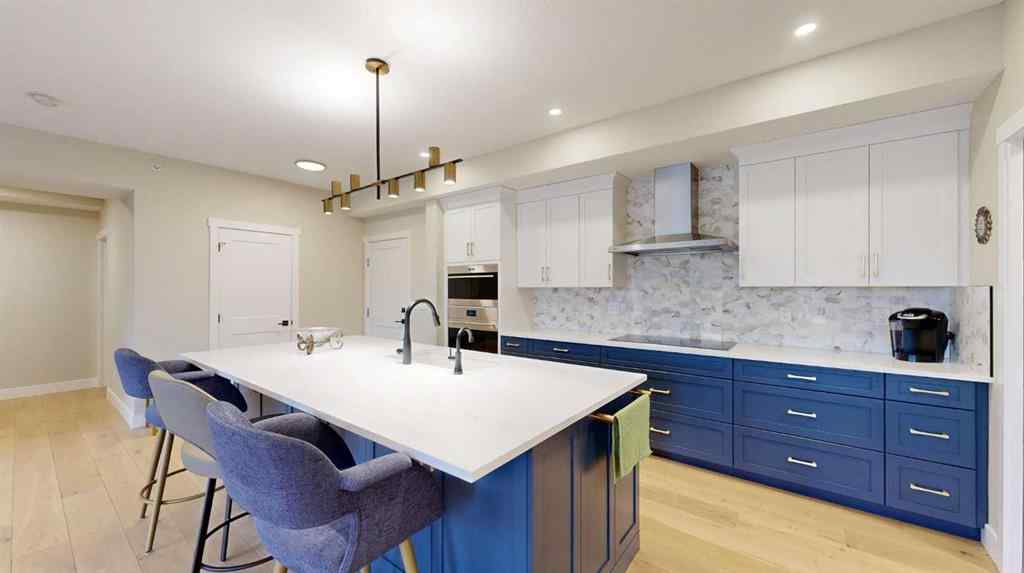 MLS® A2223664 - Unit #409 15 Cougar Ridge Landing SW in Patterson Calgary, Residential