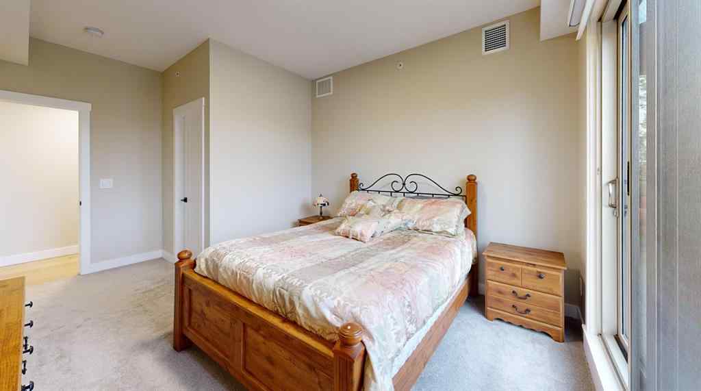 MLS® A2223664 - Unit #409 15 Cougar Ridge Landing SW in Patterson Calgary, Residential