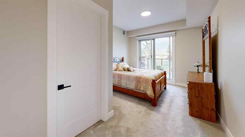 MLS® A2223664 - Unit #409 15 Cougar Ridge Landing SW in Patterson Calgary, Residential