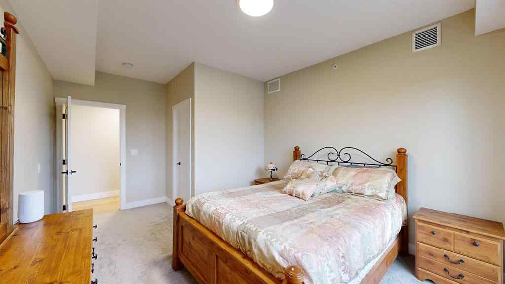 MLS® A2223664 - Unit #409 15 Cougar Ridge Landing SW in Patterson Calgary, Residential