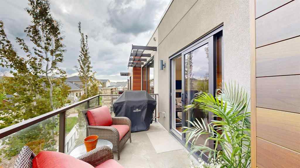 MLS® A2223664 - Unit #409 15 Cougar Ridge Landing SW in Patterson Calgary, Residential