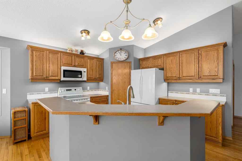 MLS® A2223765 - 310 Riverside Garden NW in Vista Mirage High River, Residential