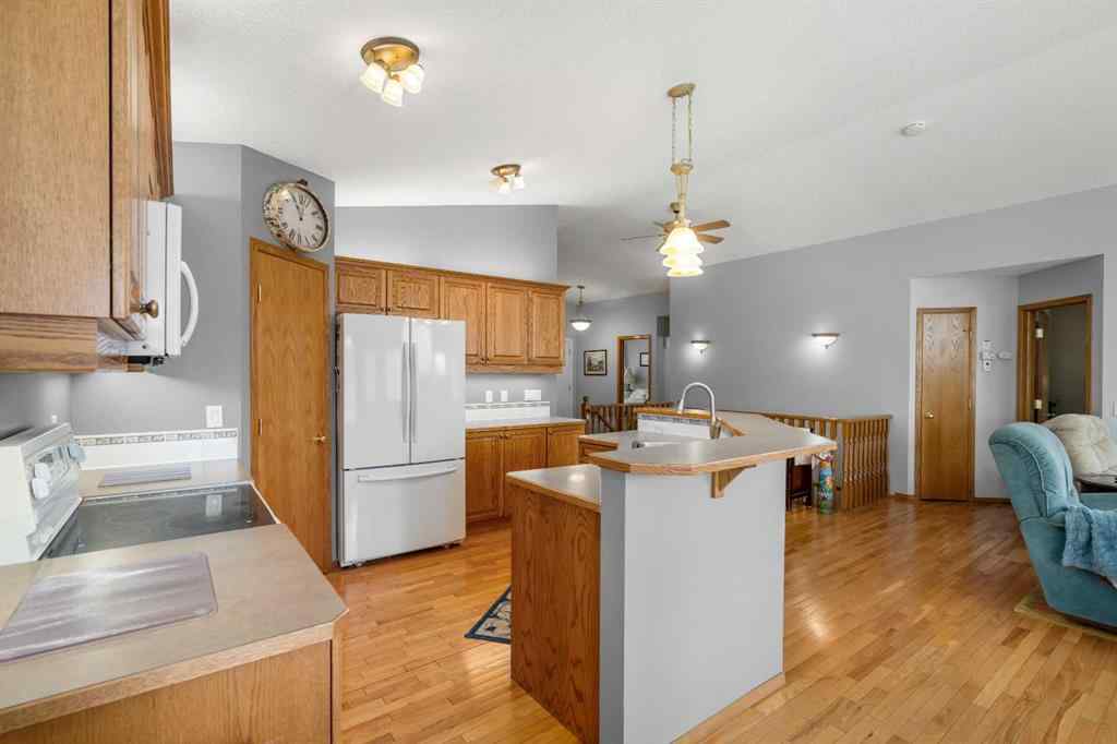 MLS® A2223765 - 310 Riverside Garden NW in Vista Mirage High River, Residential
