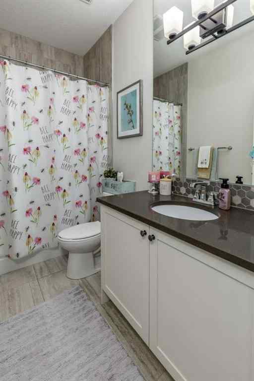 MLS® A2223855 - 74 Bayview Circle SW in Bayview Airdrie, Residential