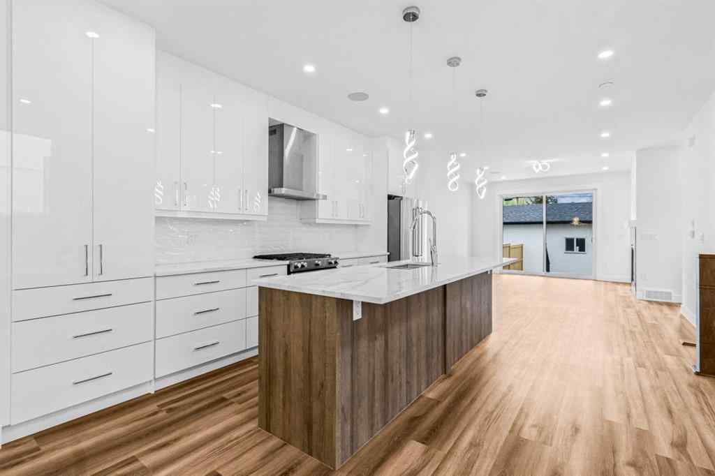 MLS® A2223893 - 430 33 Avenue NW in Highland Park Calgary, Residential