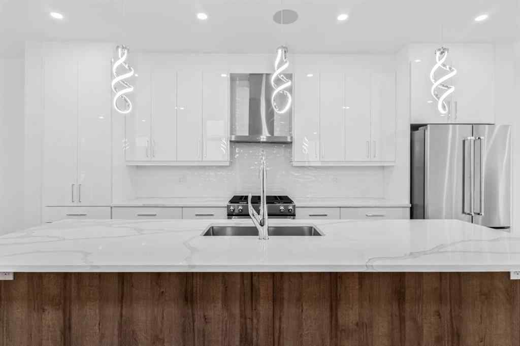 MLS® A2223893 - 430 33 Avenue NW in Highland Park Calgary, Residential