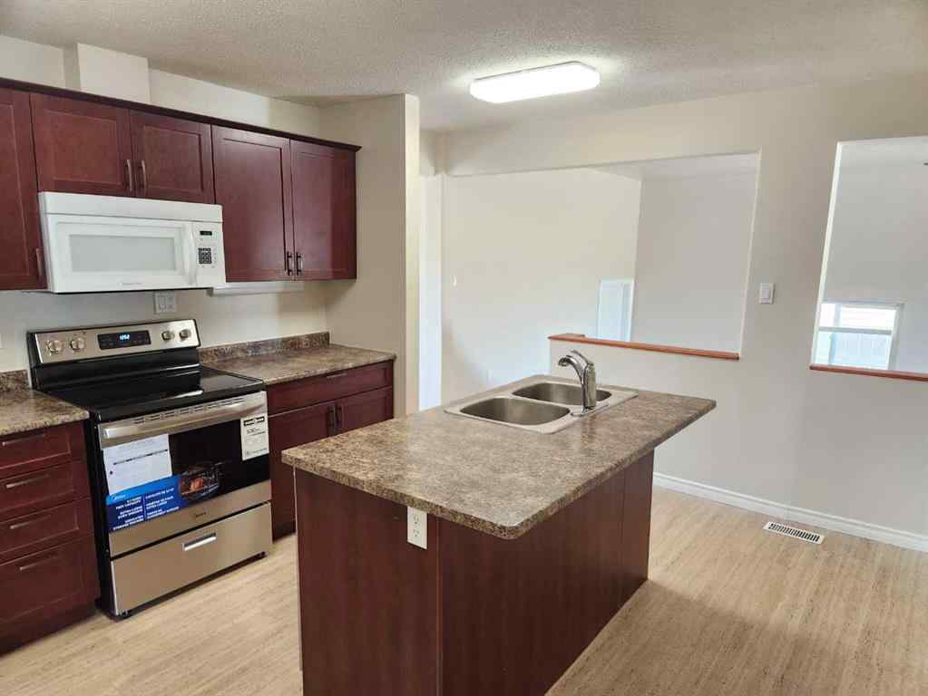 MLS® A2223975 - 1112 44 Avenue N in Legacy Ridge / Hardieville Lethbridge, Residential