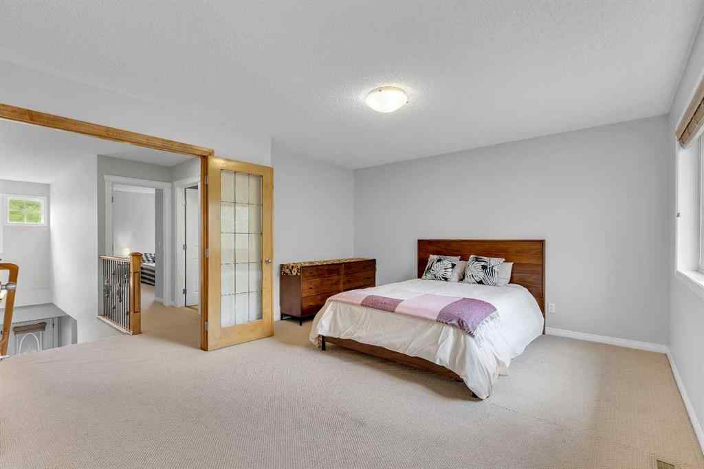 MLS® A2224331 - 40 Crestmont Way SW in Crestmont Calgary, Residential