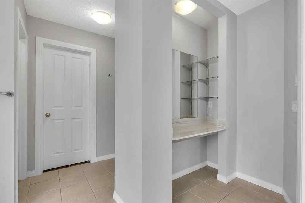 MLS® A2224331 - 40 Crestmont Way SW in Crestmont Calgary, Residential
