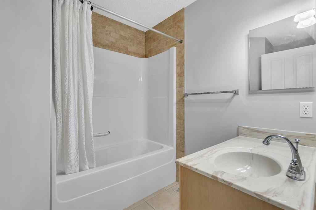 MLS® A2224331 - 40 Crestmont Way SW in Crestmont Calgary, Residential