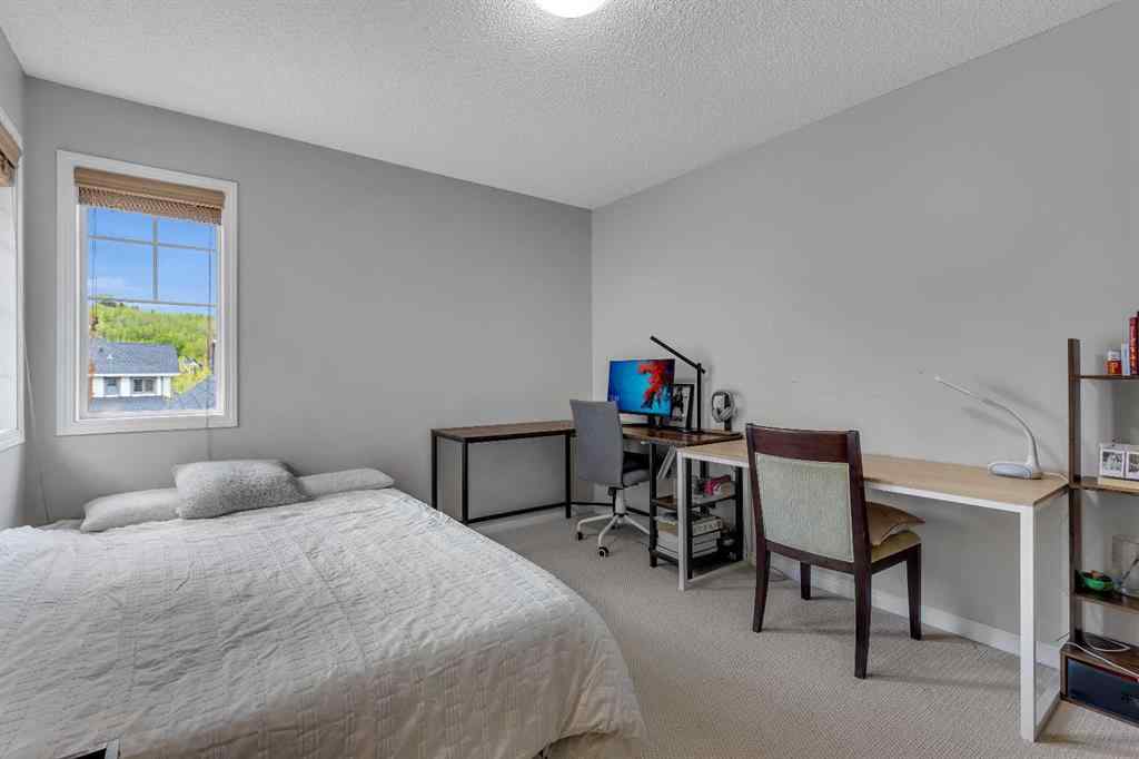 MLS® A2224331 - 40 Crestmont Way SW in Crestmont Calgary, Residential