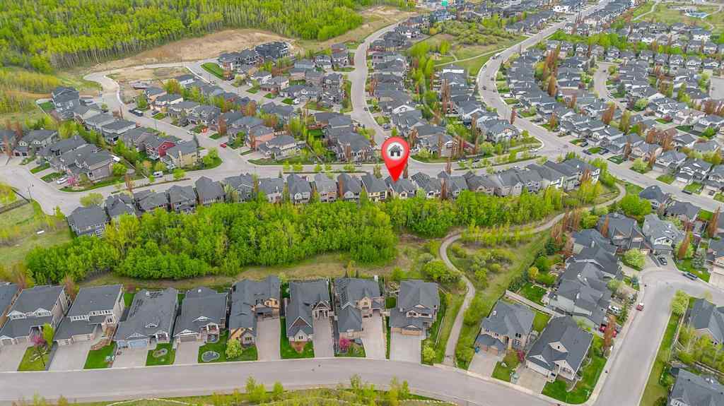 MLS® A2224331 - 40 Crestmont Way SW in Crestmont Calgary, Residential