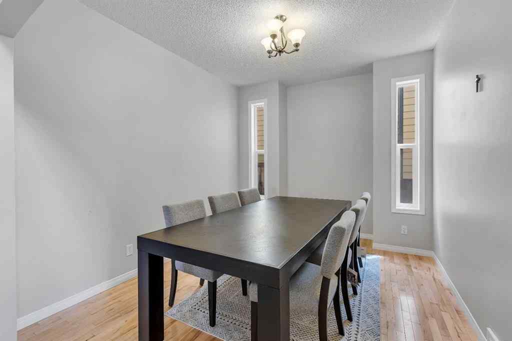 MLS® A2224331 - 40 Crestmont Way SW in Crestmont Calgary, Residential
