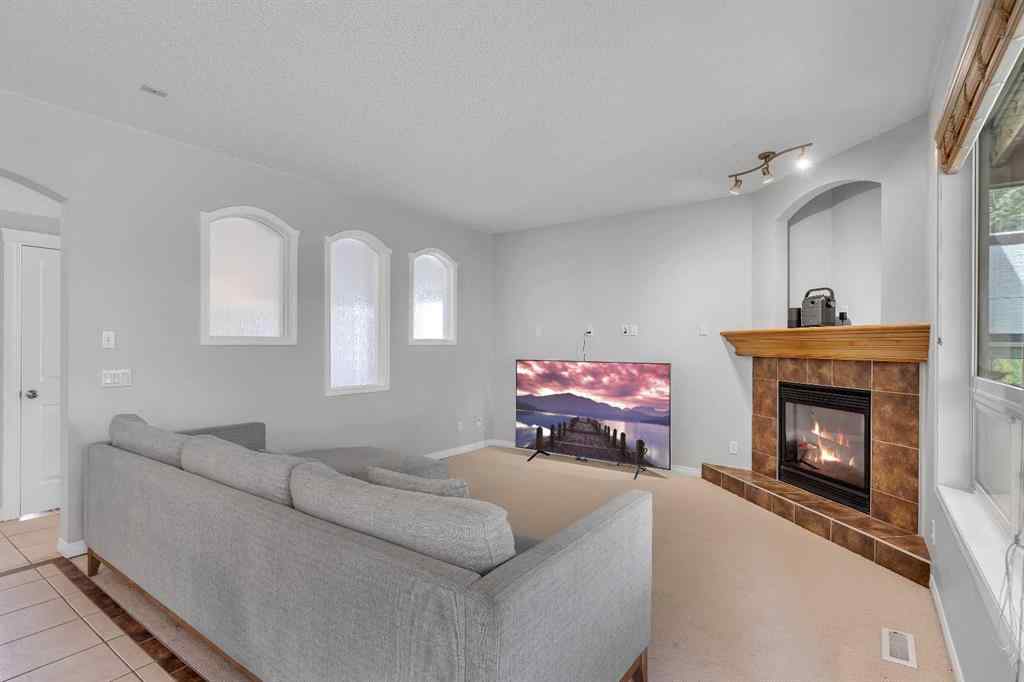 MLS® A2224331 - 40 Crestmont Way SW in Crestmont Calgary, Residential