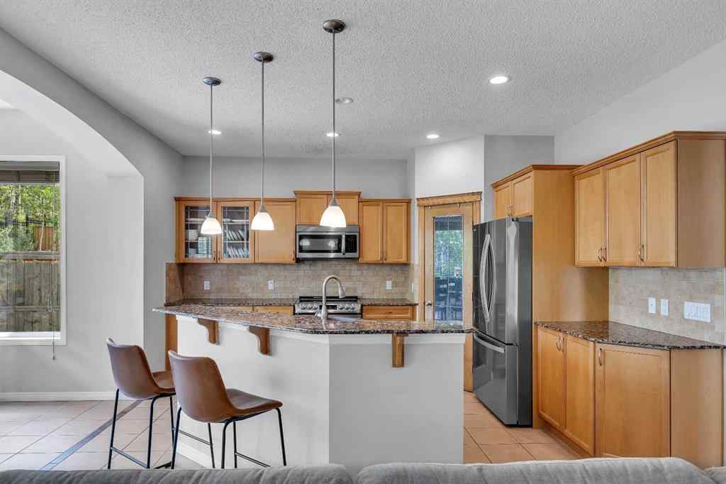 MLS® A2224331 - 40 Crestmont Way SW in Crestmont Calgary, Residential