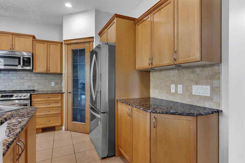 MLS® A2224331 - 40 Crestmont Way SW in Crestmont Calgary, Residential