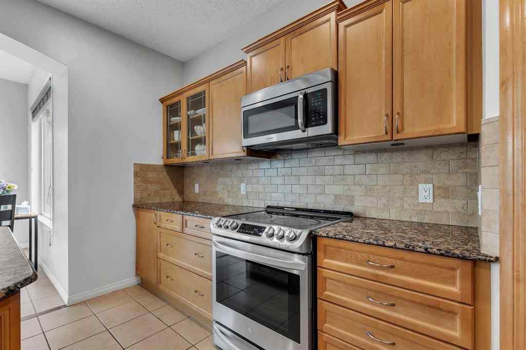 MLS® A2224331 - 40 Crestmont Way SW in Crestmont Calgary, Residential