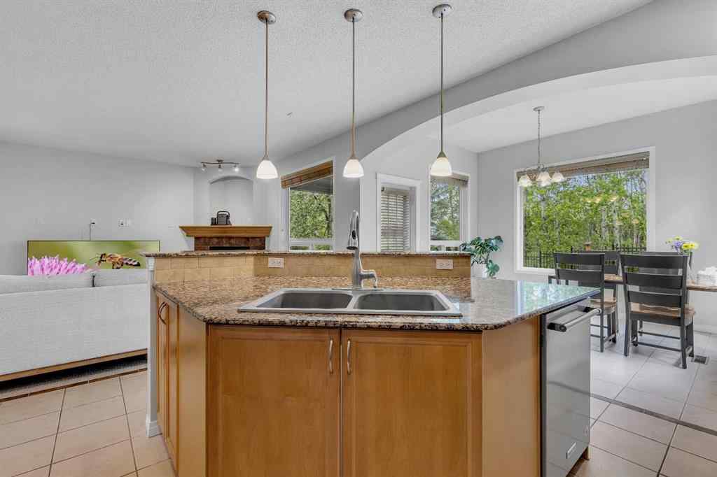 MLS® A2224331 - 40 Crestmont Way SW in Crestmont Calgary, Residential
