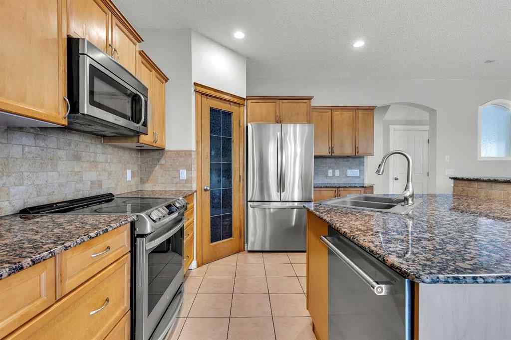 MLS® A2224331 - 40 Crestmont Way SW in Crestmont Calgary, Residential