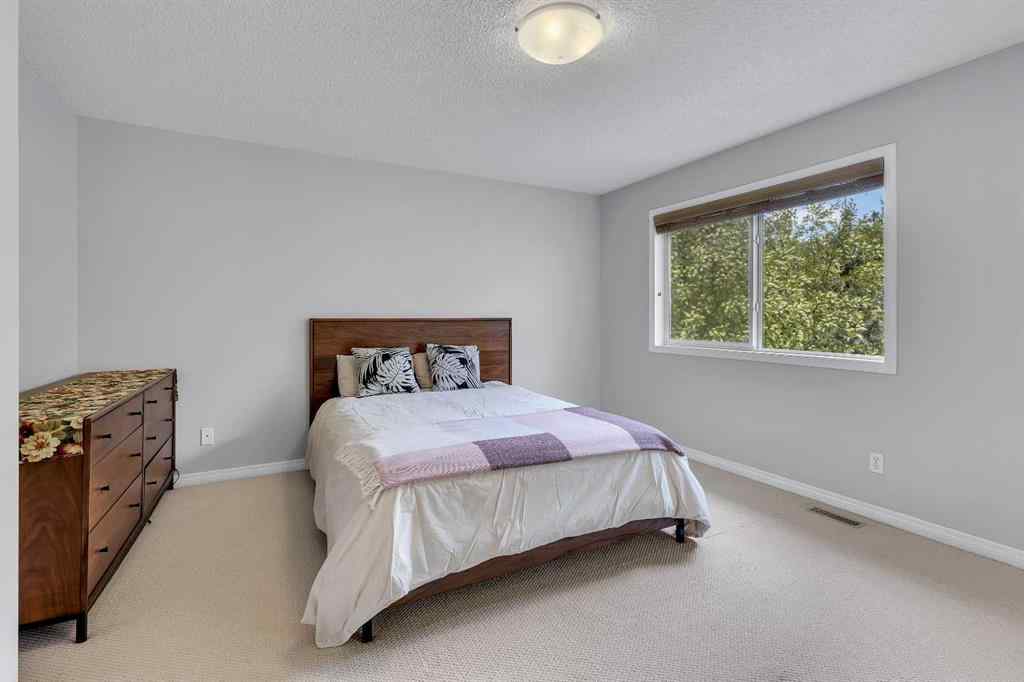 MLS® A2224331 - 40 Crestmont Way SW in Crestmont Calgary, Residential