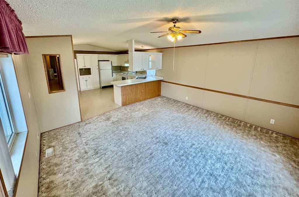 MLS® A2224376 - Unit #328 37543 England Way  in Waskasoo Estates Rural Red Deer County, Mobile