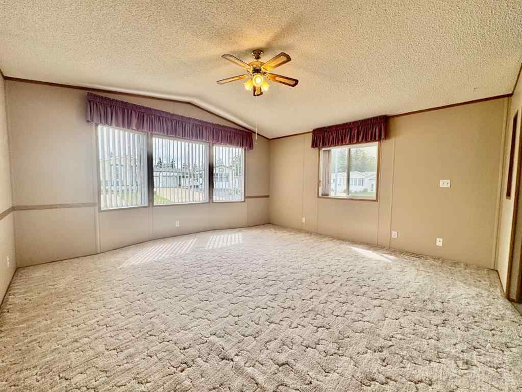 MLS® A2224376 - Unit #328 37543 England Way  in Waskasoo Estates Rural Red Deer County, Mobile