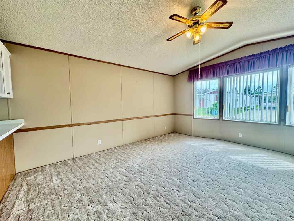 MLS® A2224376 - Unit #328 37543 England Way  in Waskasoo Estates Rural Red Deer County, Mobile