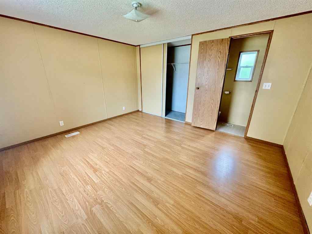MLS® A2224376 - Unit #328 37543 England Way  in Waskasoo Estates Rural Red Deer County, Mobile