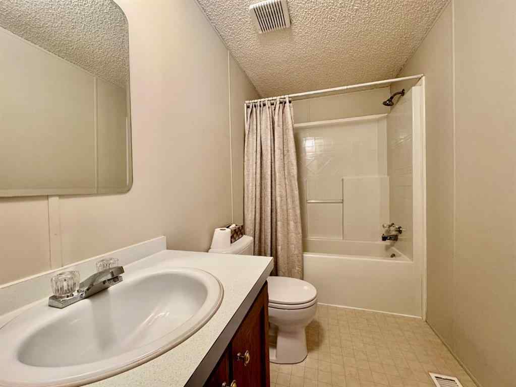 MLS® A2224376 - Unit #328 37543 England Way  in Waskasoo Estates Rural Red Deer County, Mobile