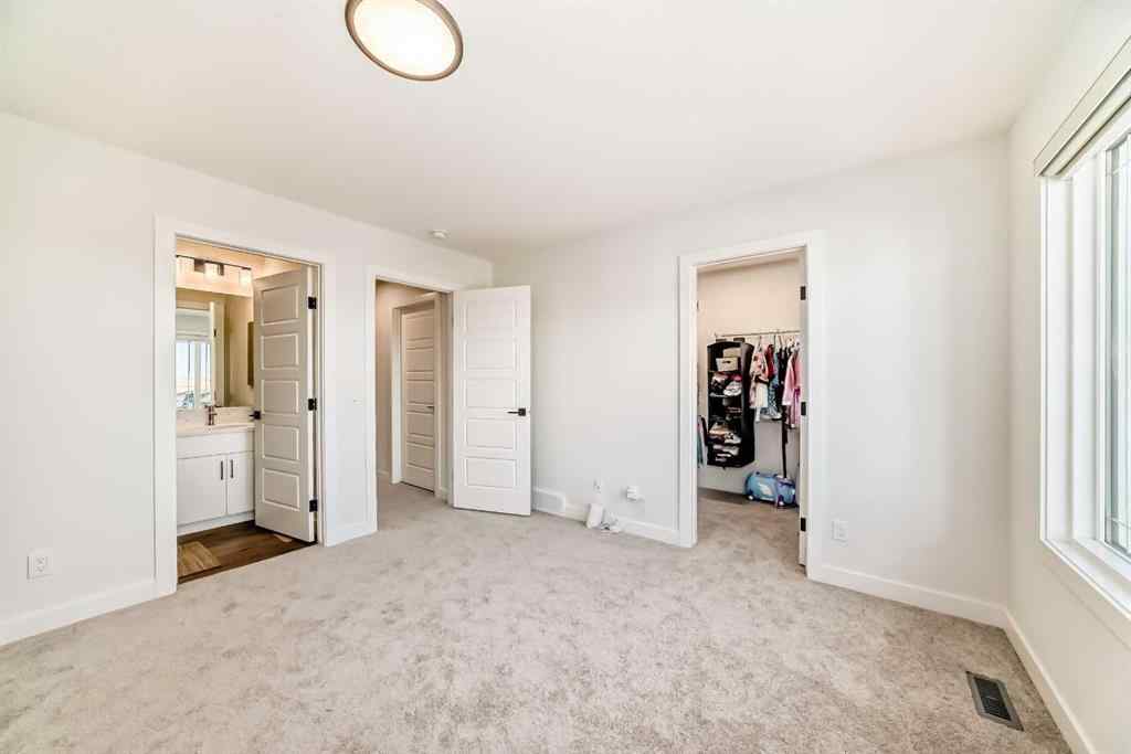 MLS® A2224492 - 116 Ambleside Crescent NW in Moraine Calgary, Residential