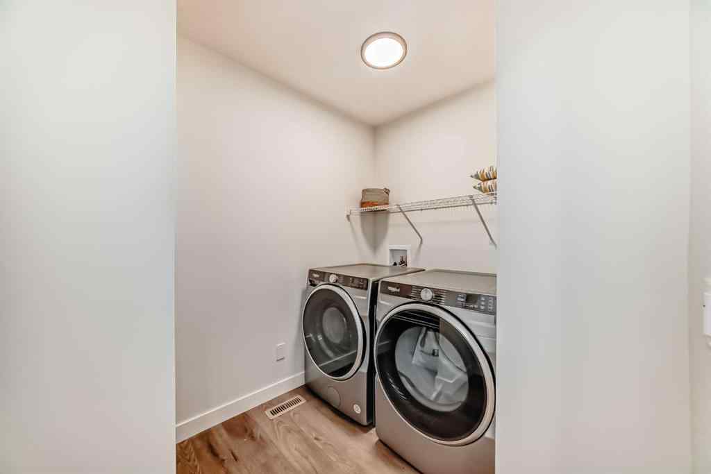 MLS® A2224492 - 116 Ambleside Crescent NW in Moraine Calgary, Residential