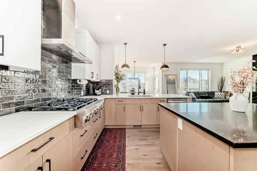MLS® A2224492 - 116 Ambleside Crescent NW in Moraine Calgary, Residential