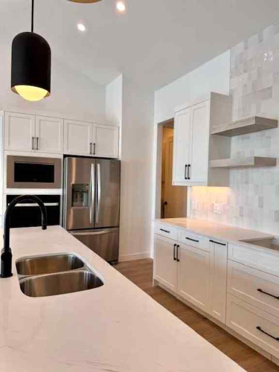 MLS® A2224823 - 61 North Bridges Bay SW in Bridges of Langdon Langdon, Residential