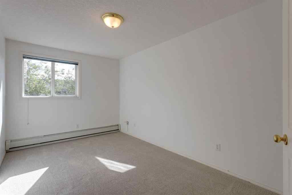 MLS® A2224940 - Unit #210 165 Manora Place NE in Marlborough Park Calgary, Residential