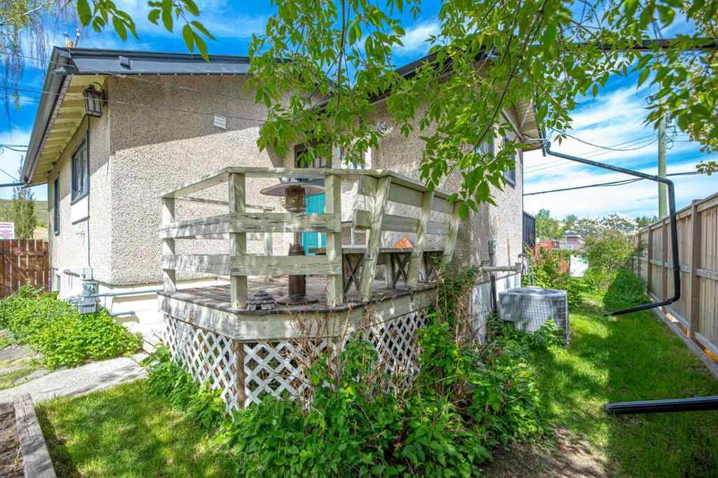 MLS® A2225005 - 313 Ross Avenue  in East End Cochrane, Commercial