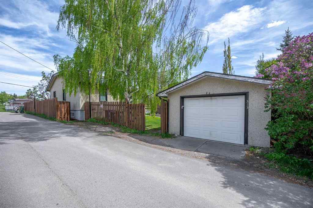 MLS® A2225005 - 313 Ross Avenue  in East End Cochrane, Commercial