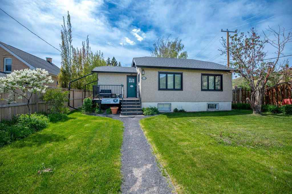 MLS® A2225005 - 313 Ross Avenue  in East End Cochrane, Commercial