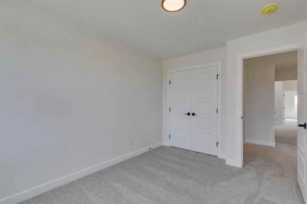 MLS® A2225028 - 51 Versant Way SW in Alpine Park Calgary, Residential