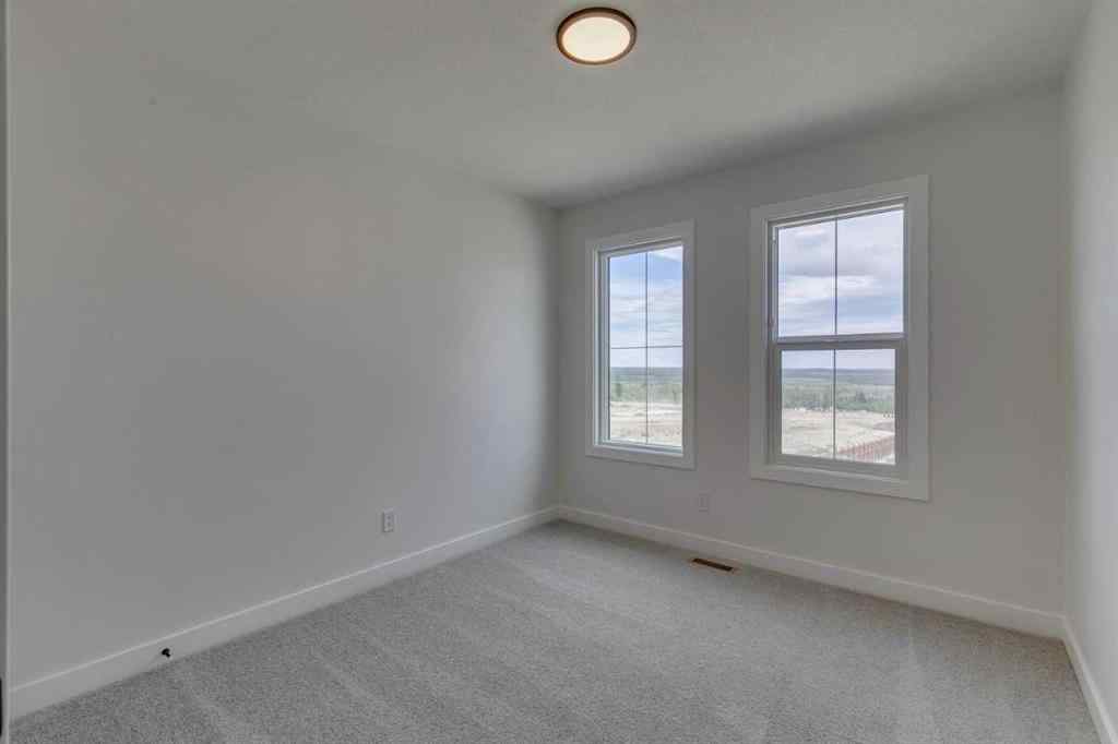MLS® A2225028 - 51 Versant Way SW in Alpine Park Calgary, Residential