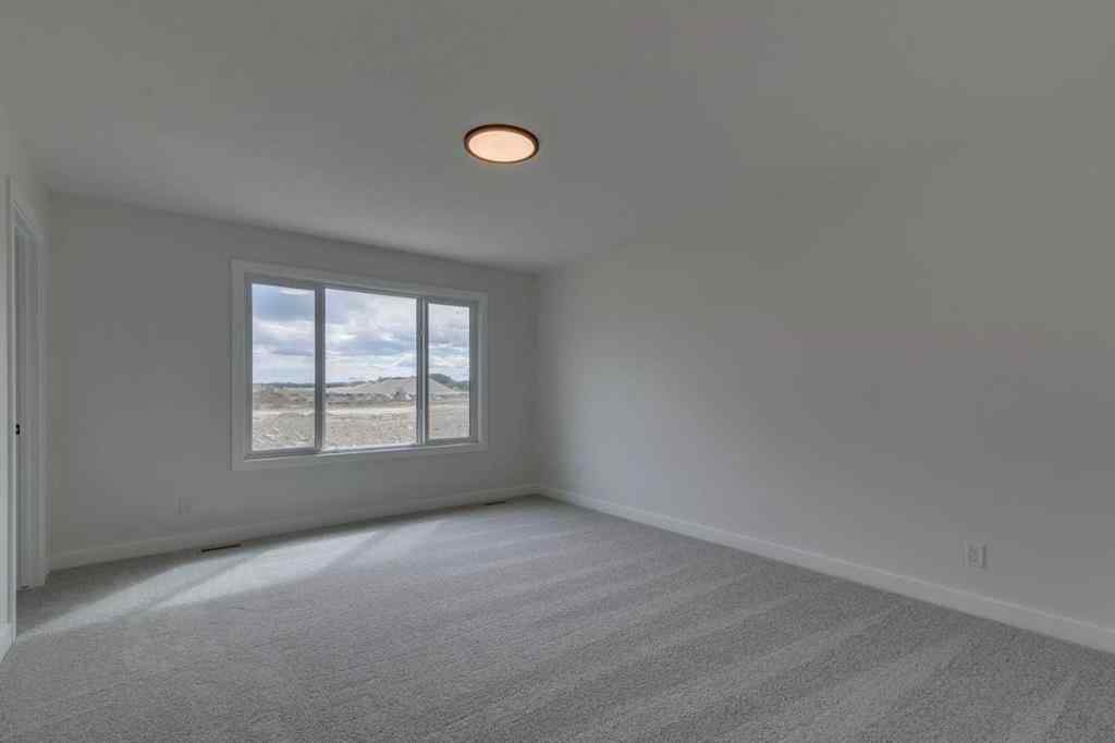 MLS® A2225028 - 51 Versant Way SW in Alpine Park Calgary, Residential
