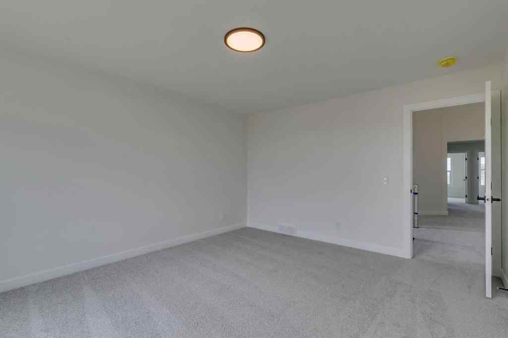 MLS® A2225028 - 51 Versant Way SW in Alpine Park Calgary, Residential