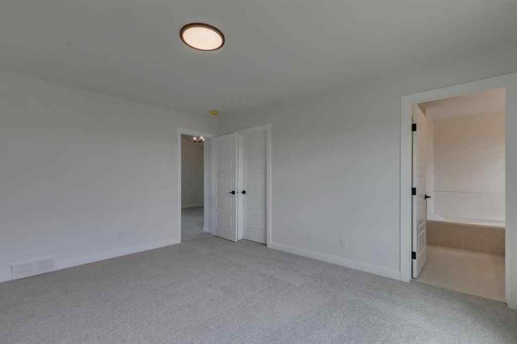 MLS® A2225028 - 51 Versant Way SW in Alpine Park Calgary, Residential