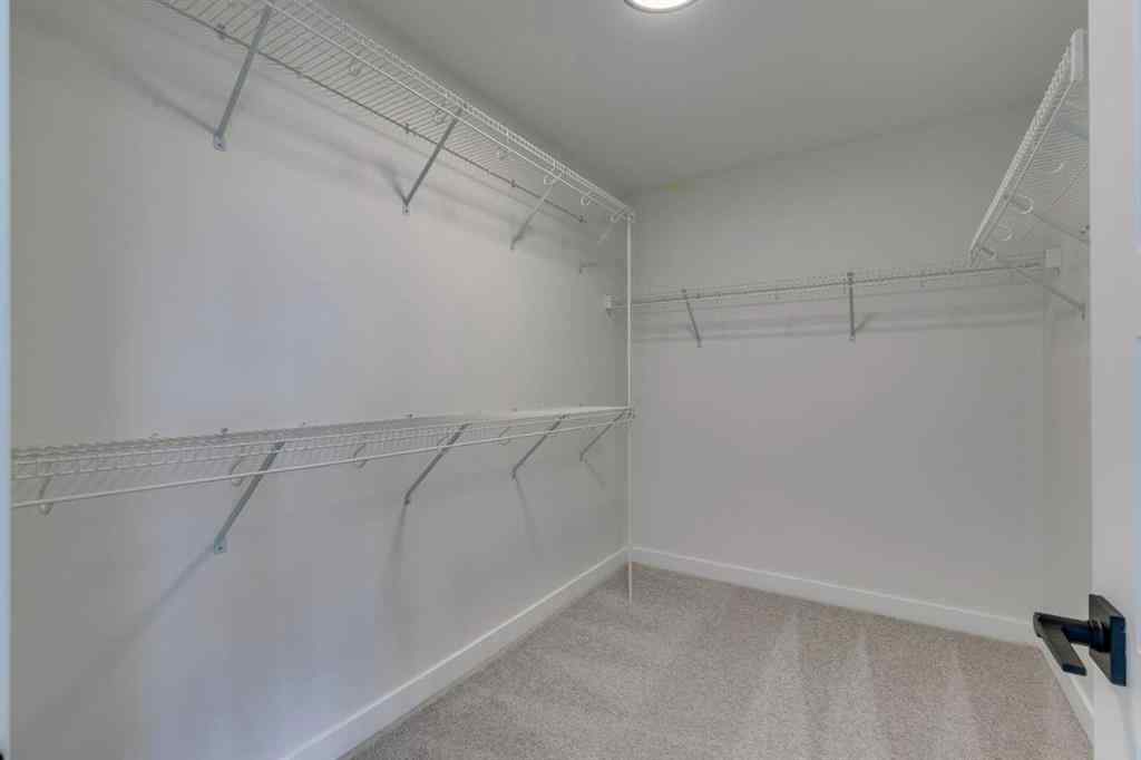 MLS® A2225028 - 51 Versant Way SW in Alpine Park Calgary, Residential
