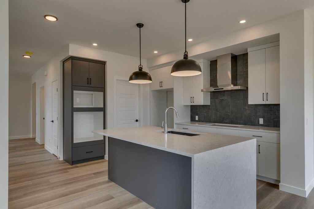 MLS® A2225028 - 51 Versant Way SW in Alpine Park Calgary, Residential